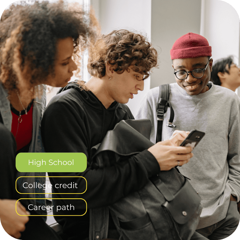 High school students participating in a structured culinary career pathway program with college credit alignment.