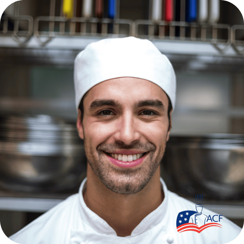 Chef apprentice in a professional kitchen representing the ACF certified culinary apprenticeship program